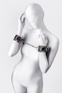 Anonymo handcuffs, PU leather, print, 19.5 cm Toyfa